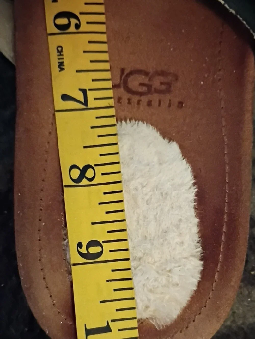 UGG Black Leather Shearling-Trim Thong Sandals with Brown Footbed
